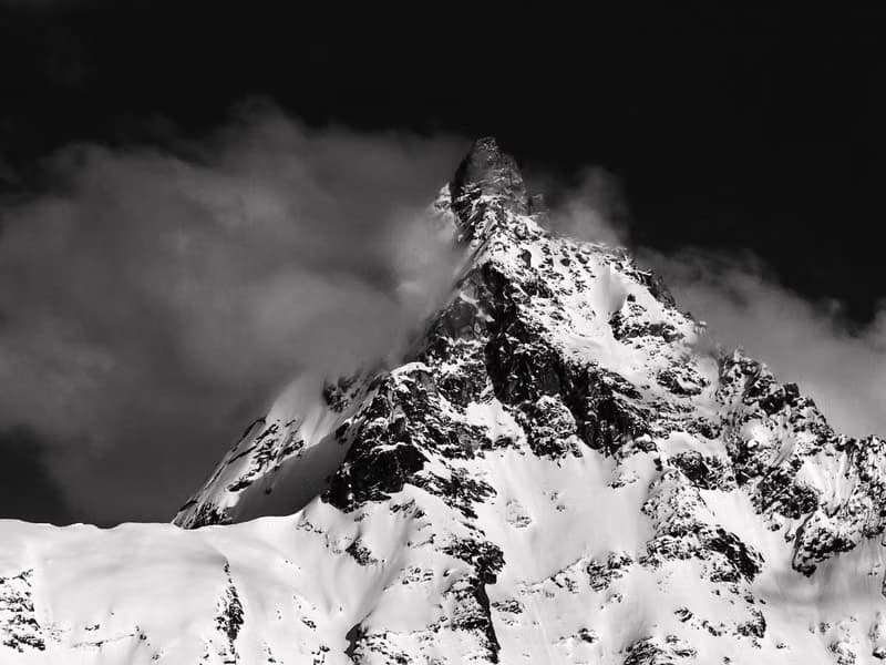 Himalayan peaks above the clouds at dusk